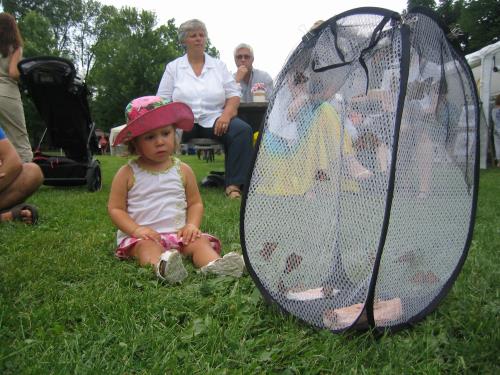 baby looks on with puzzled look